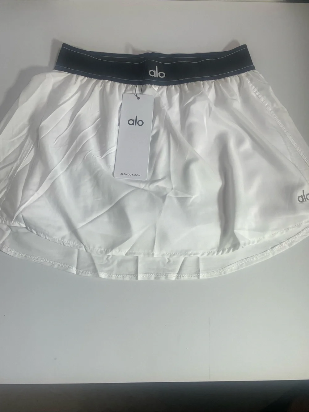 ALO Yoga White Skirt with Black Elastic Waistband